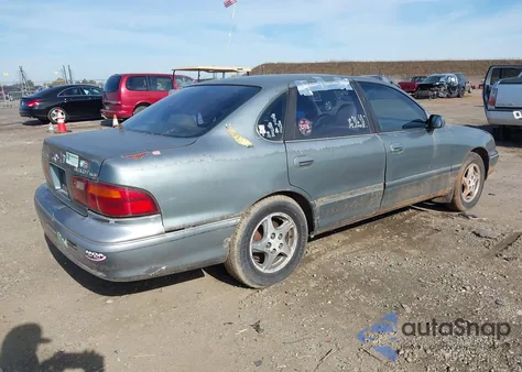 1998 Toyota Avalon Xls z USA, uszkodzony, nr VIN 4T1BF18B3WU280027